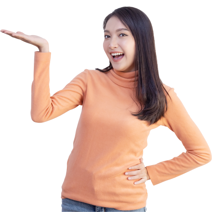 A woman in an orange turtleneck is smiling and holding out her hand