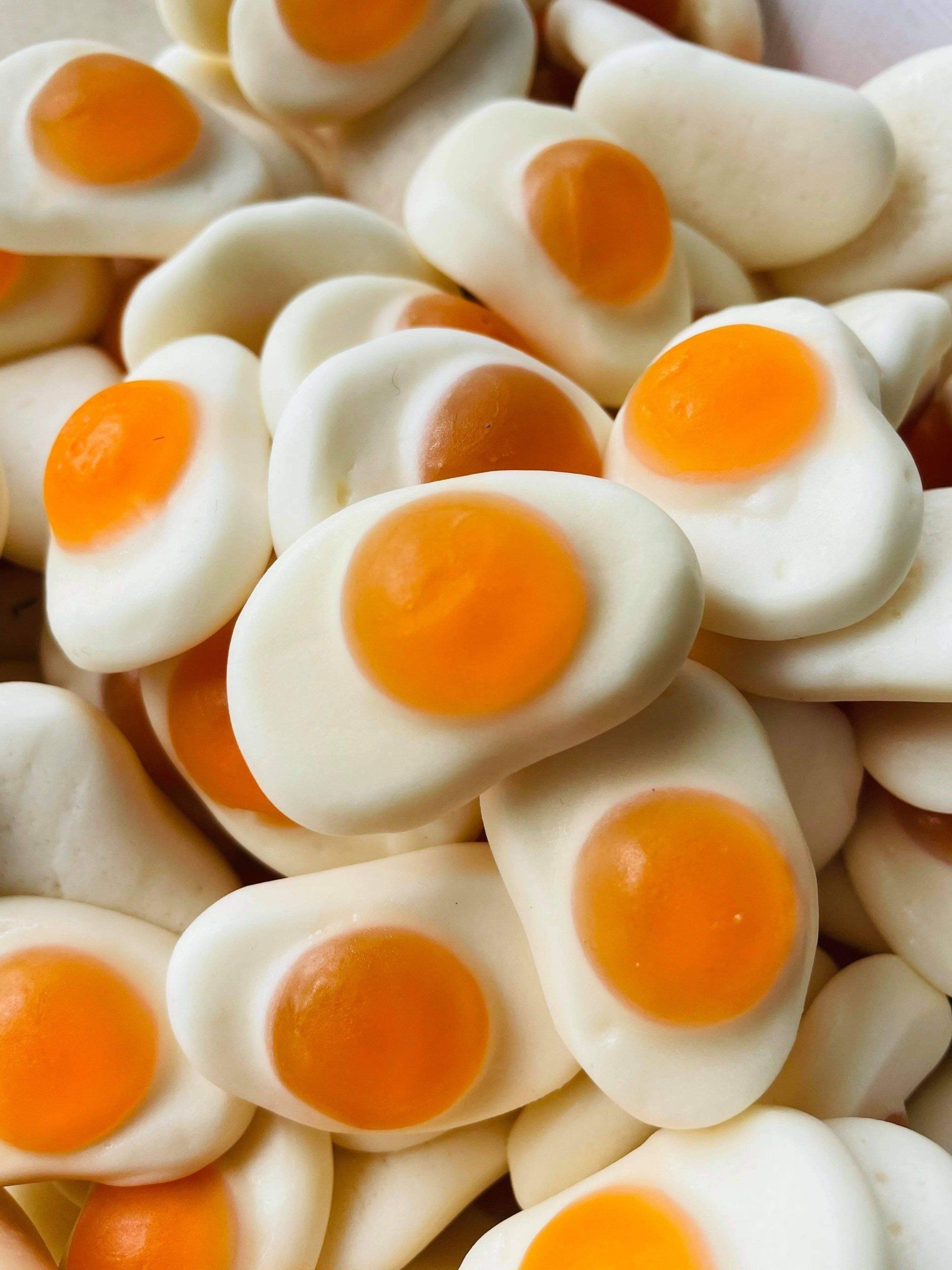 A pile of candy that looks like fried eggs