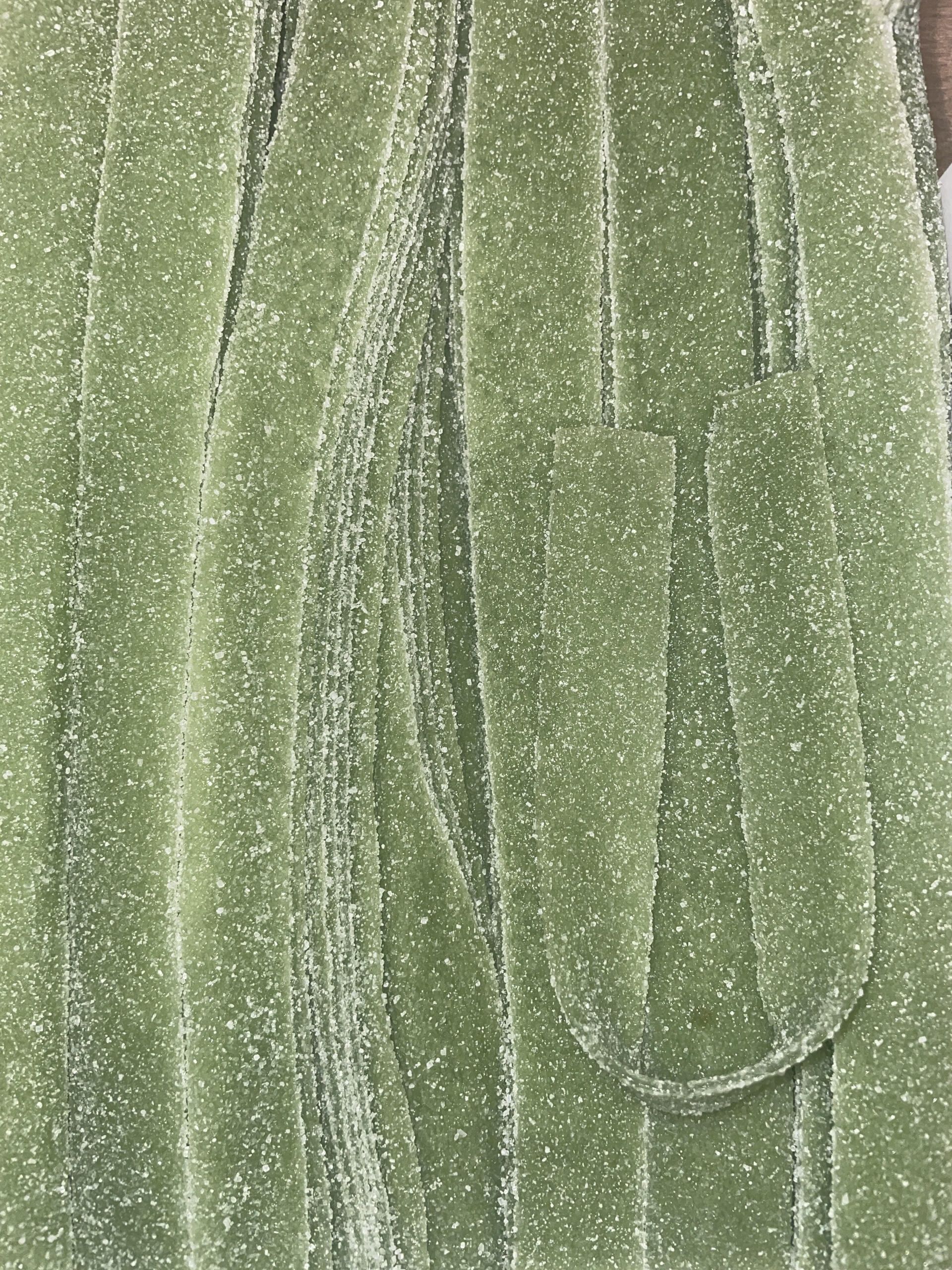 A close up of a green velvet fabric.