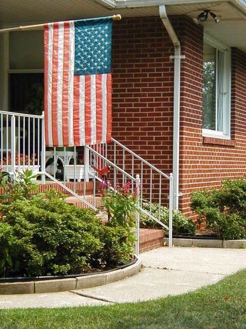 House With Flag — Baldwin, MD — J.W. Calvert MFG.