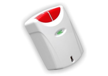 A white hkc device with a red button on it