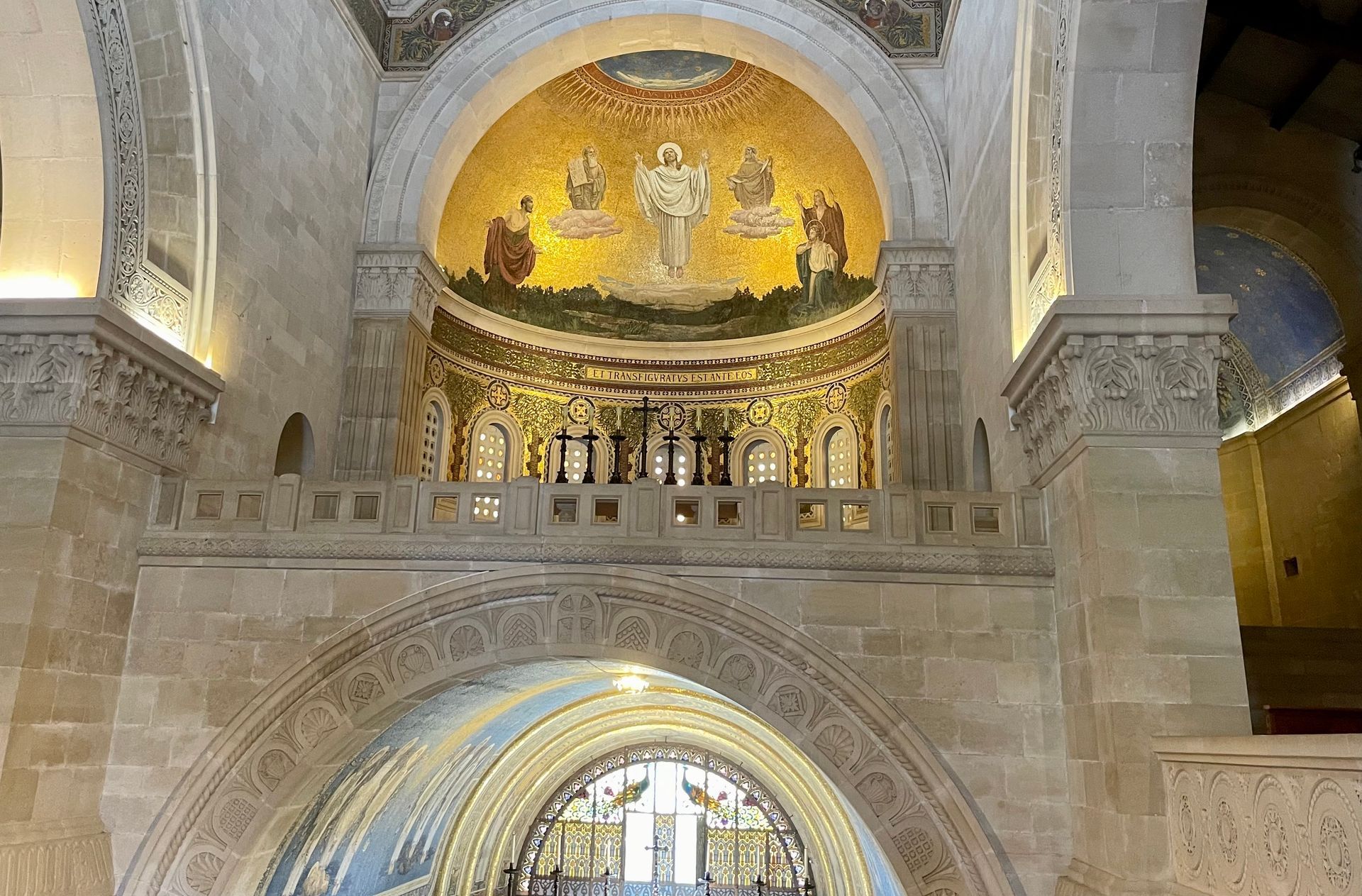 A church with a painting of jesus on the ceiling