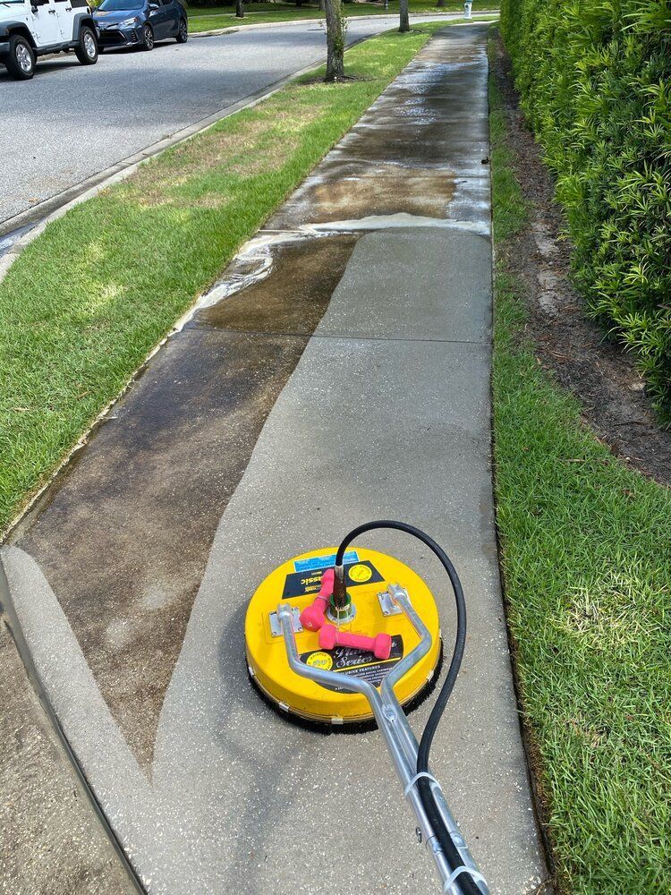 Sidewalk with Pressure Washer - Orlando, FL - Strada Solutions