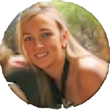 A woman with long blonde hair is smiling in a circle