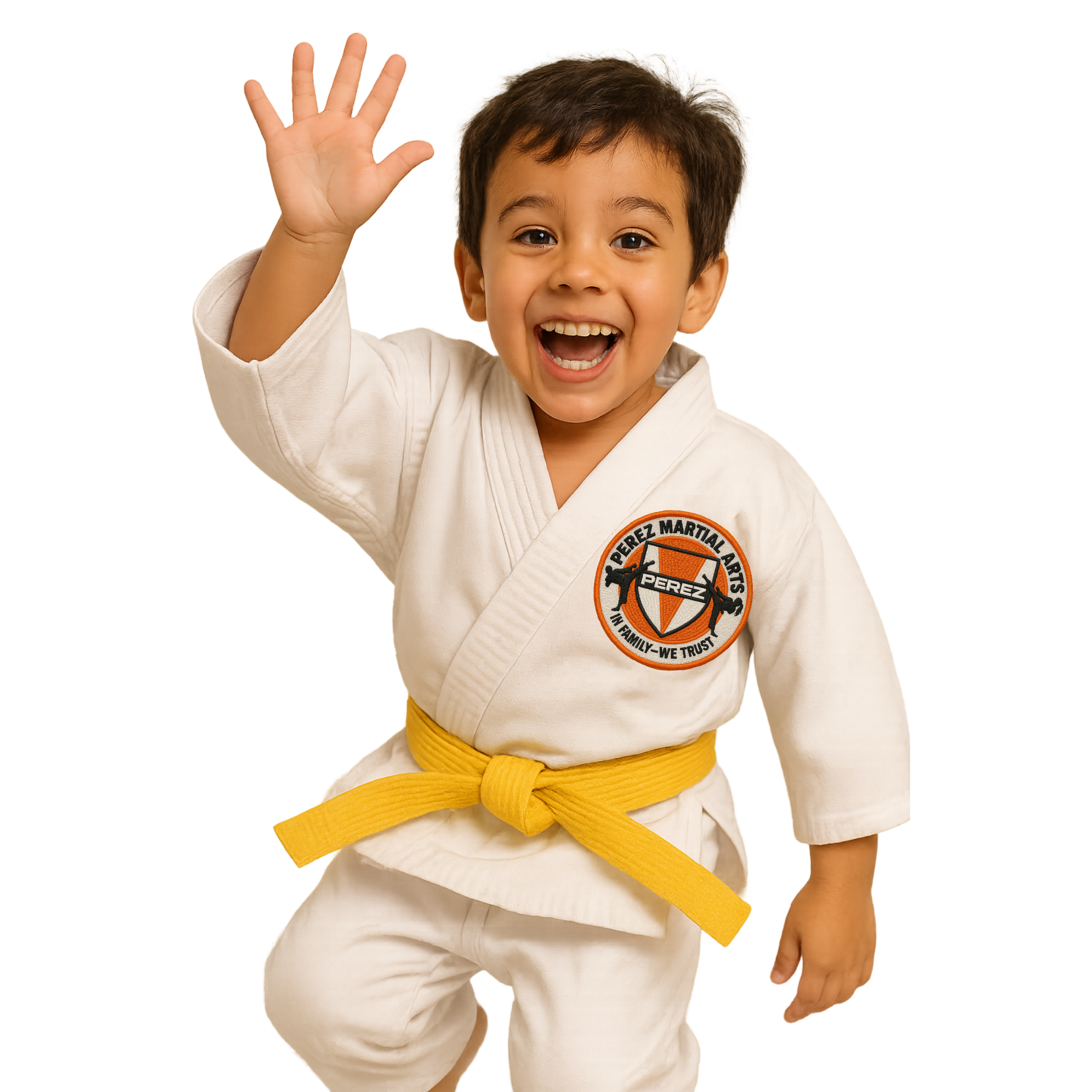 A young boy in a white karate uniform is raising his arms in the air.