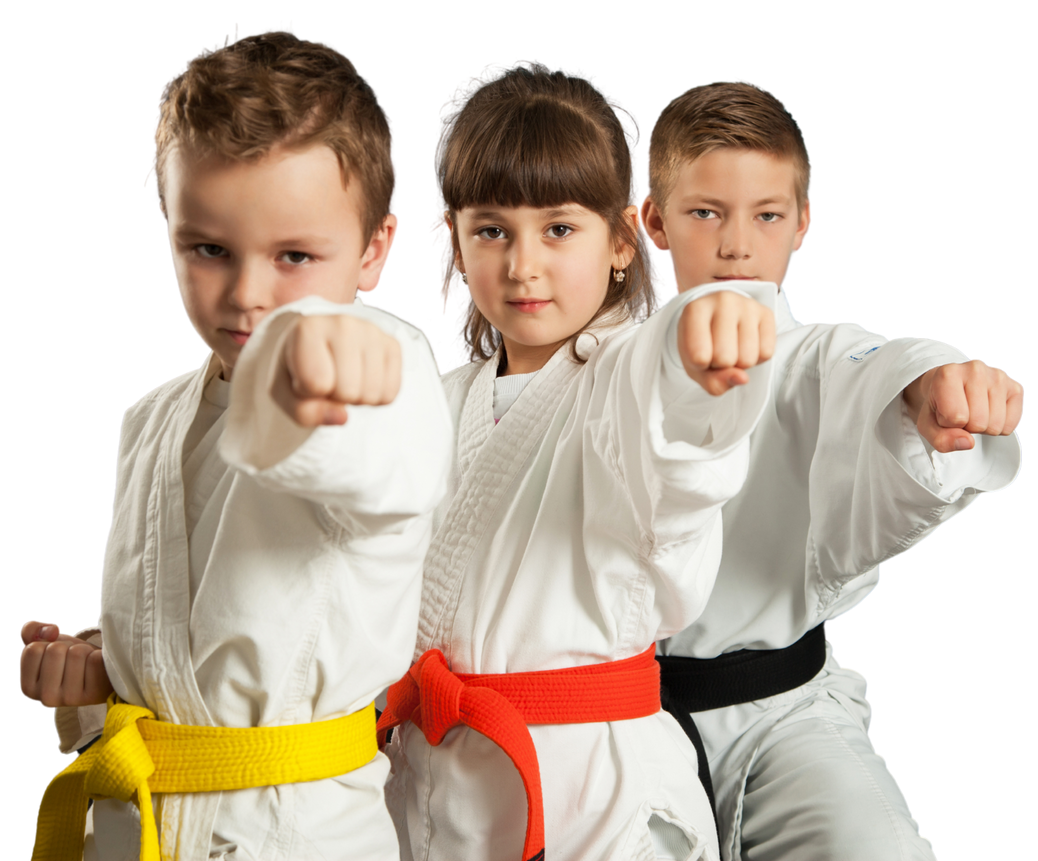 Three children in karate uniforms are sitting on the floor and giving a thumbs up.