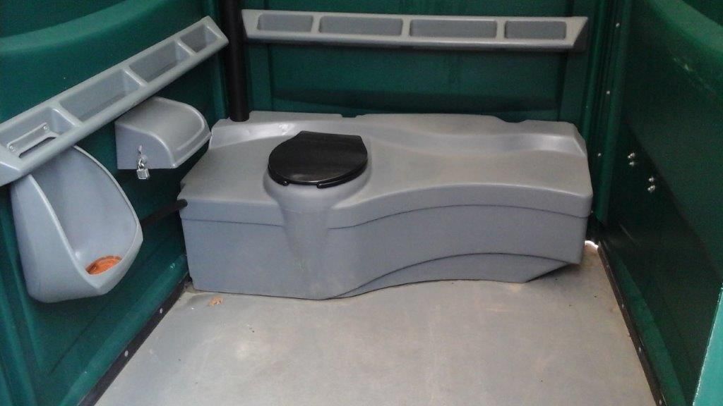 A portable toilet with a urinal next to it