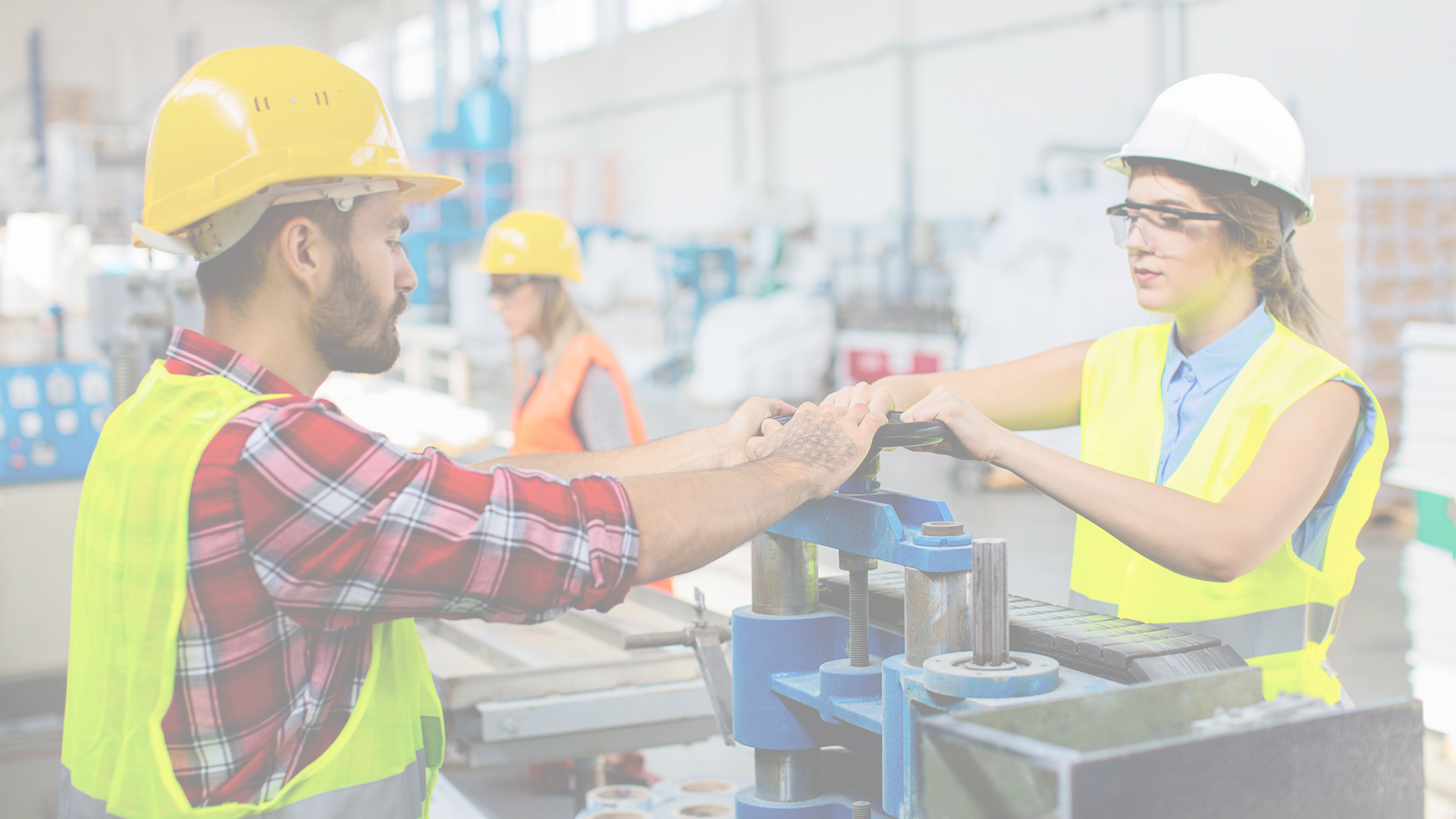 Two employees in manufacturing working on a production line