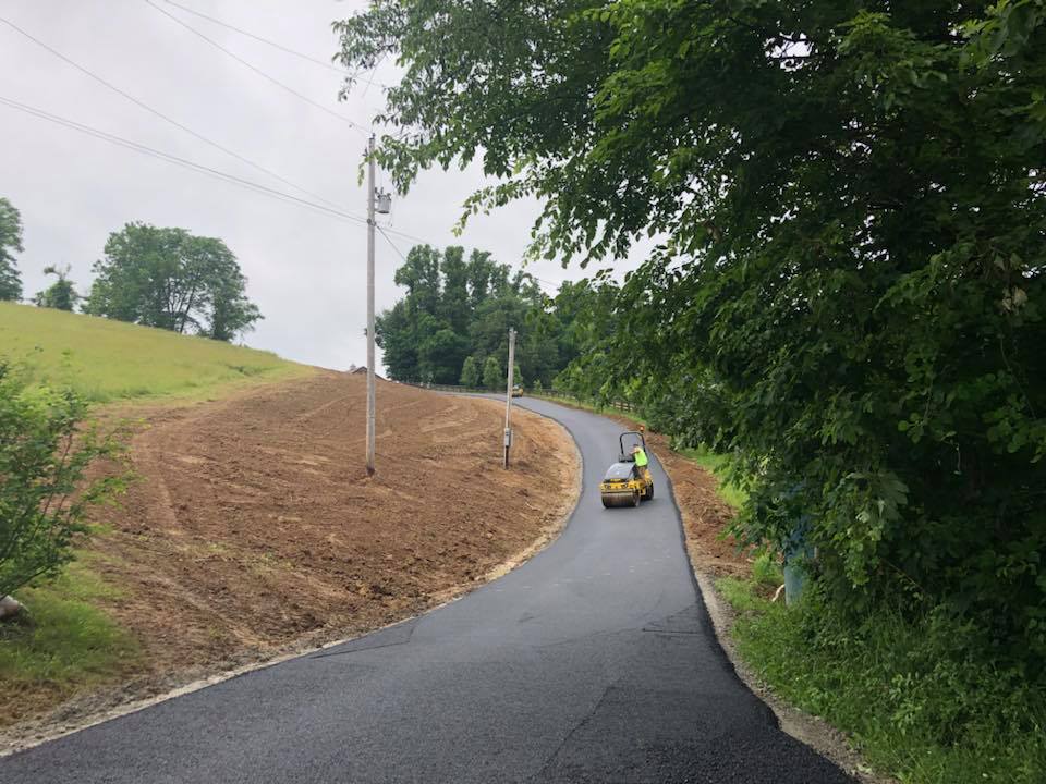 Concrete Installation — Asphalt Roller in a Down Road in Zanesville, OH