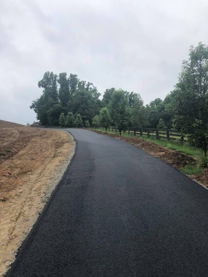 Concrete Services — Asphalt Road with Trees in Zanesville, OH