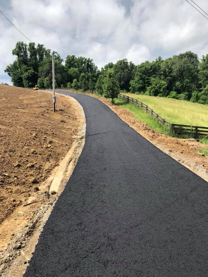 Concrete Application — Road Rolling an Asphalt Road in Zanesville, OH