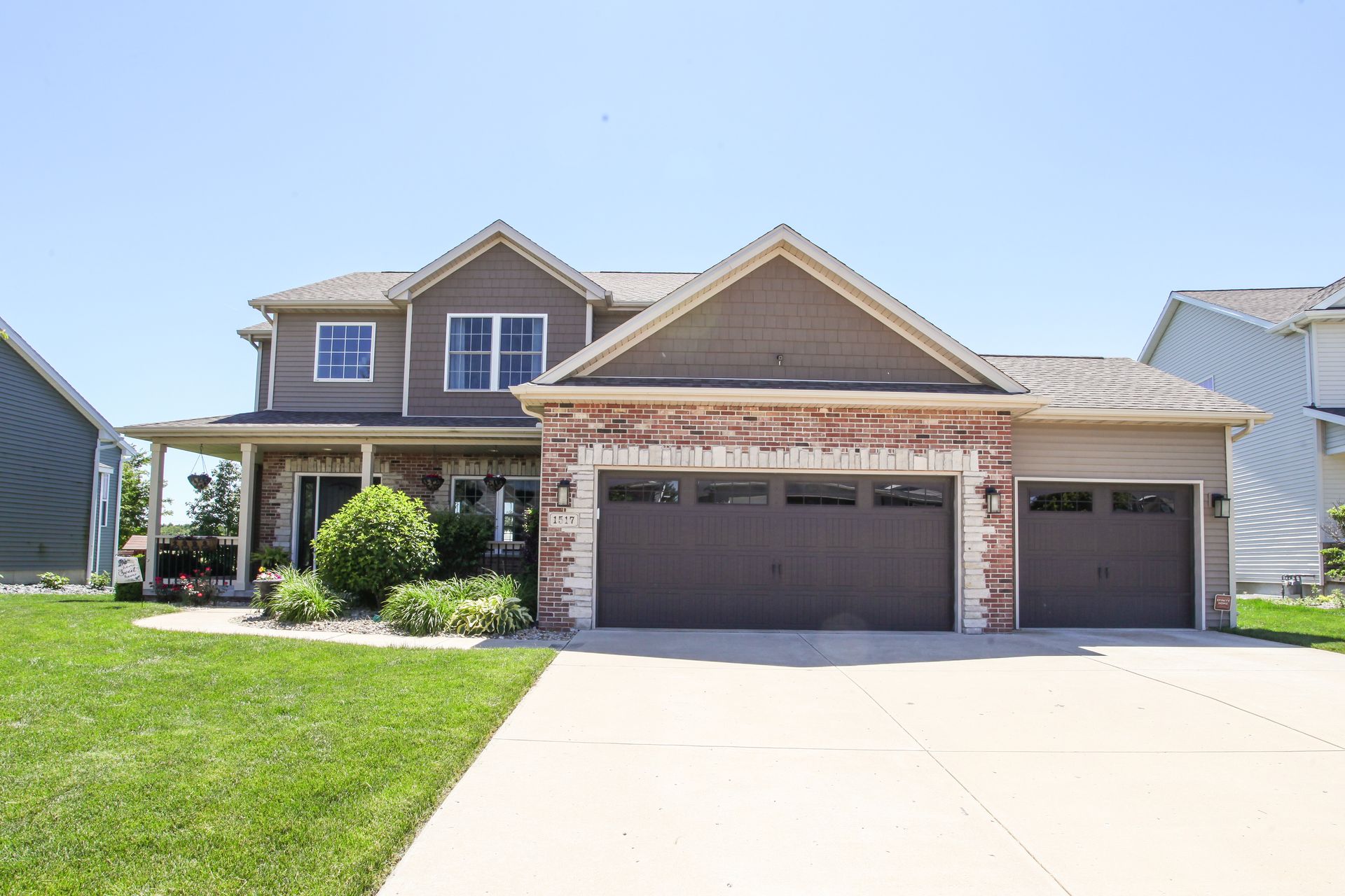 front of a 3 car garage home