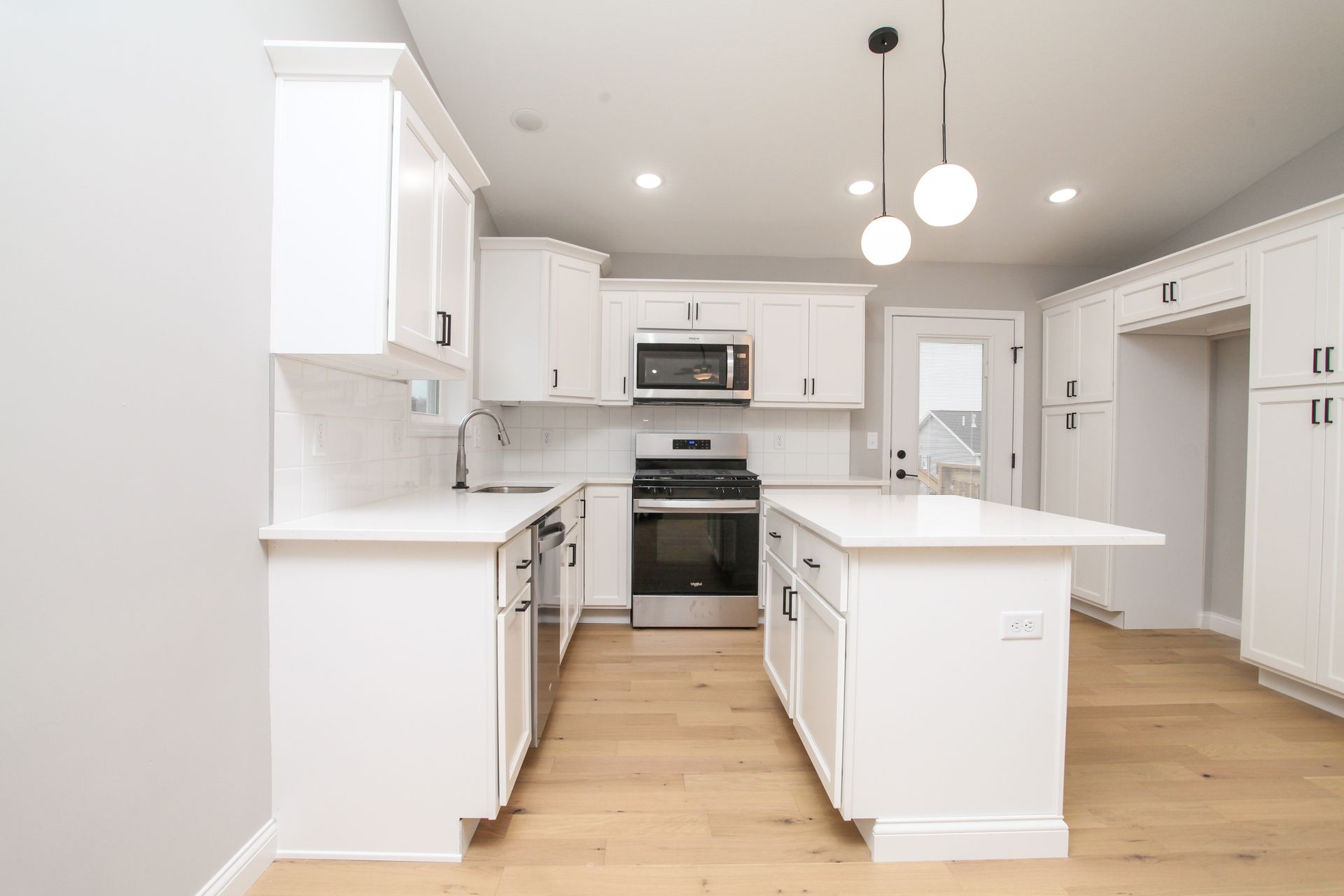 white kitchen with center island