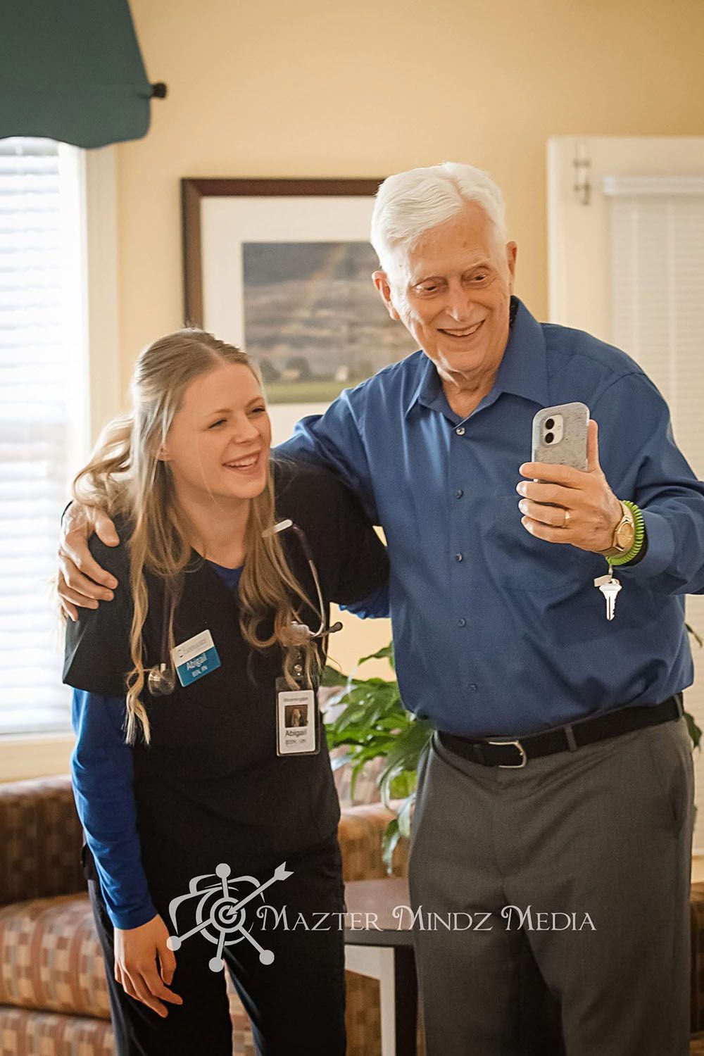 Senior taking a selfie with a nurse