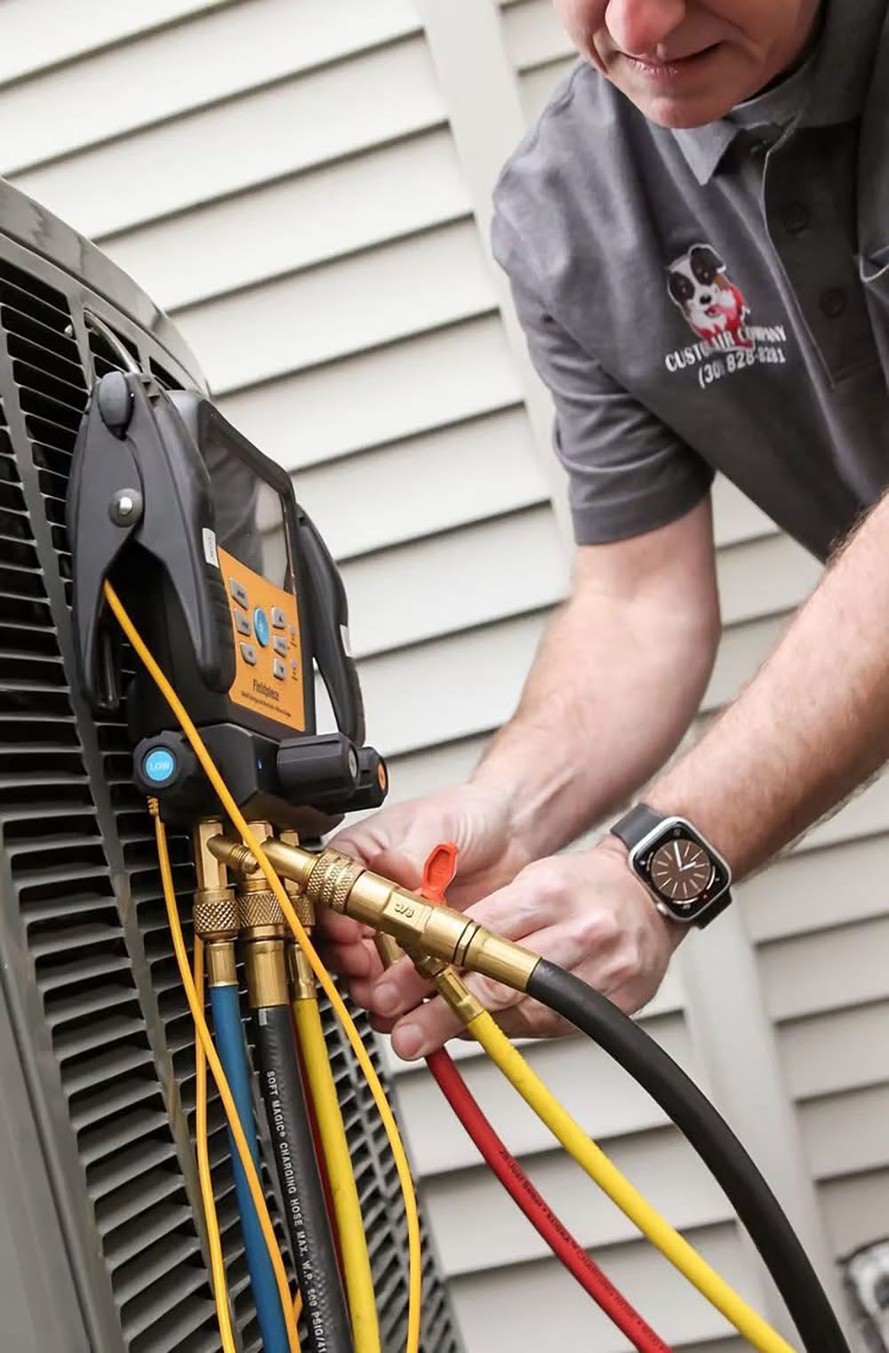 HVAC technician working on A/C