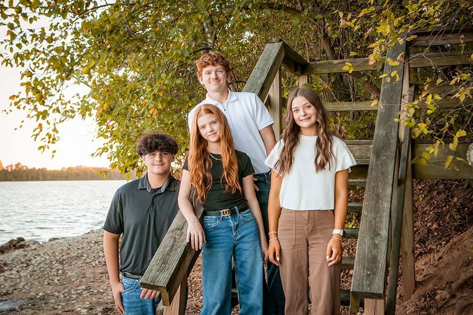 Siblings posing for a pic by Mazter Mindz Media Bloomington IL Photographer
