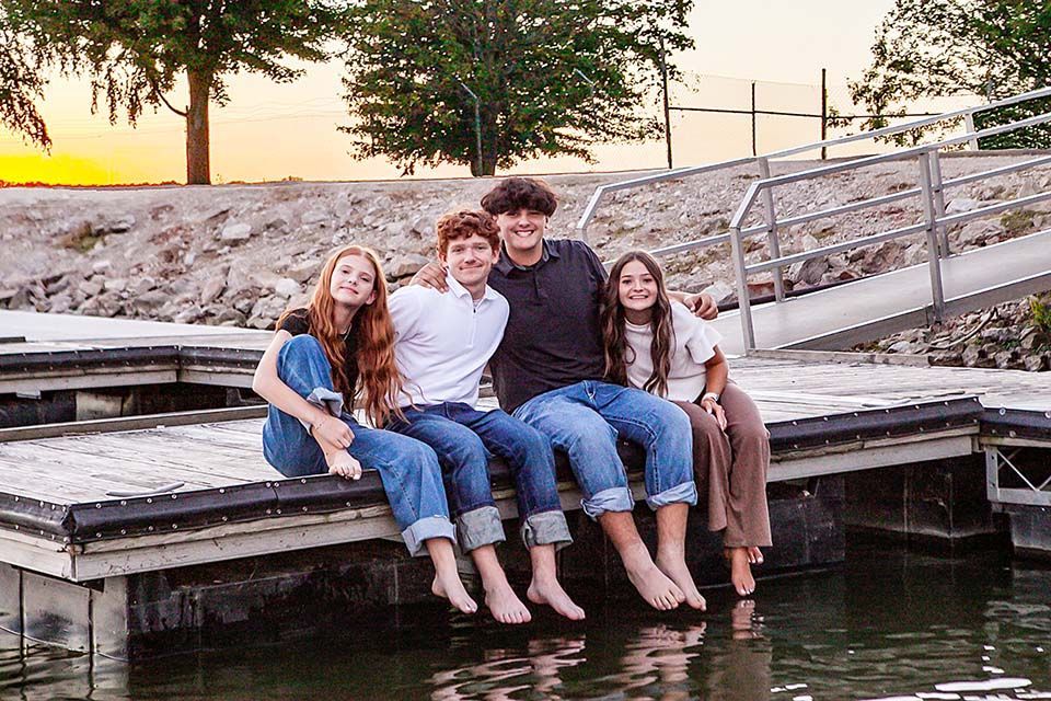 Teen kids on a dock by Mazter Mindz Media Bloomington IL Photographer