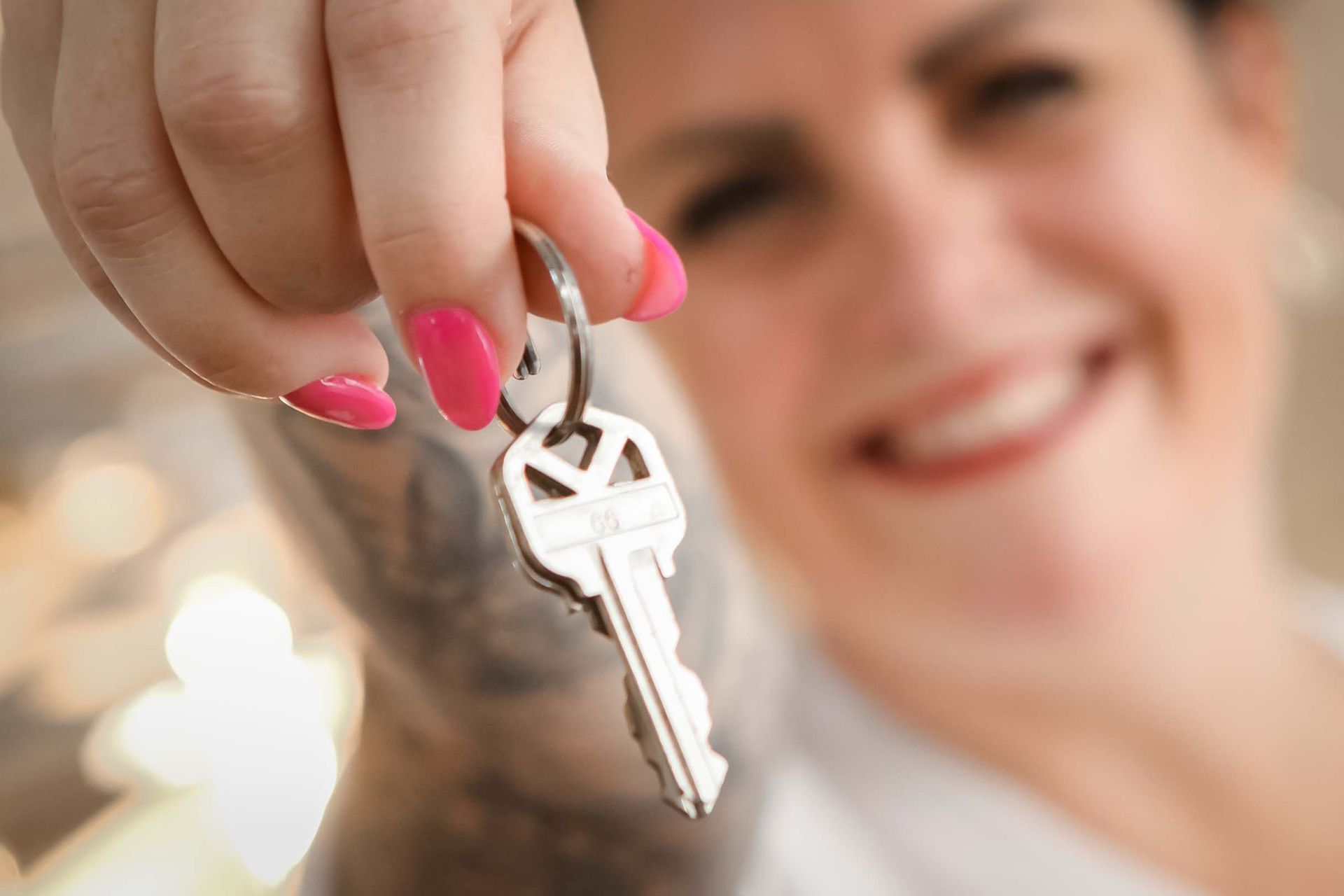 Realtor holding a set of keys