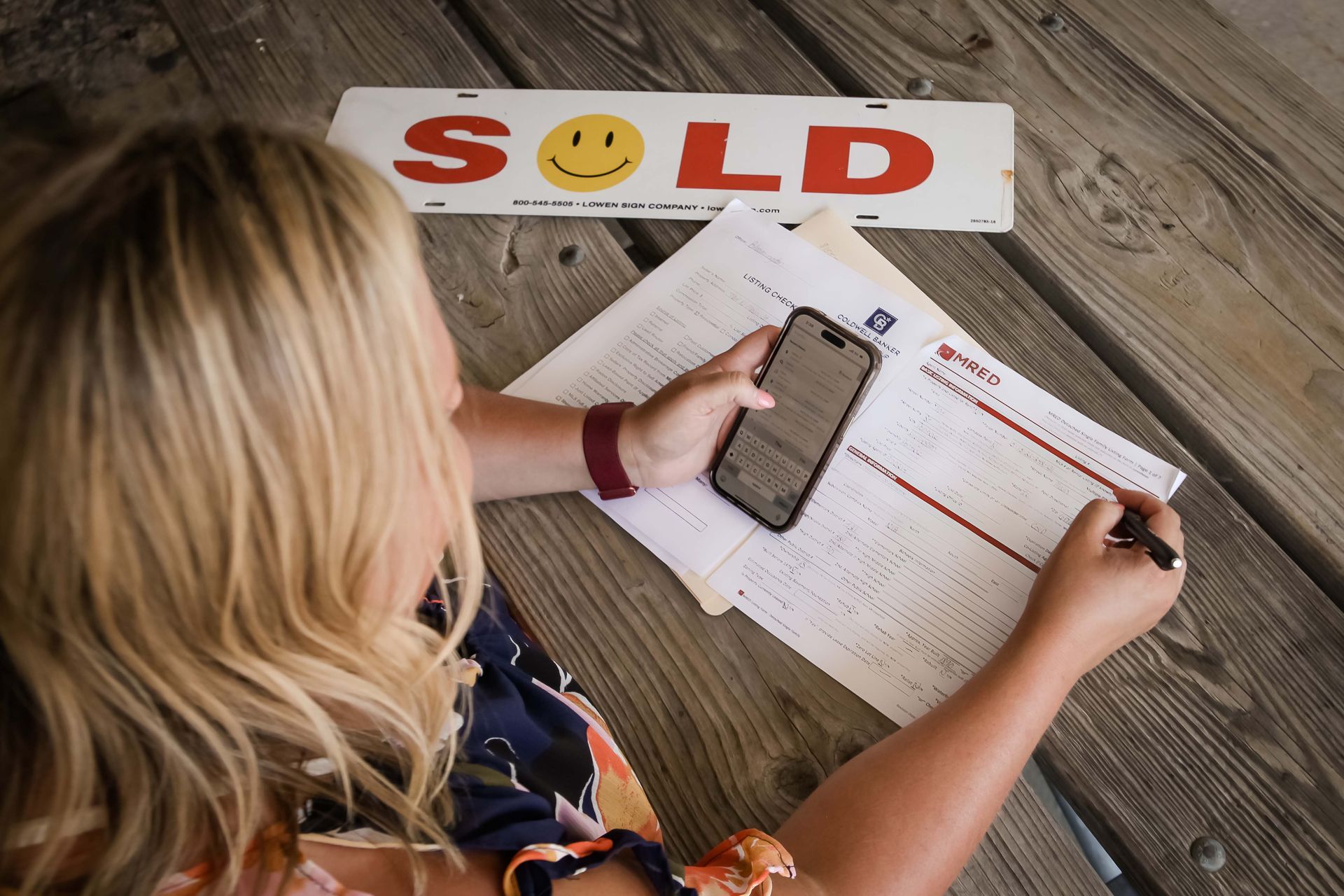 overhead view of a realtor doing paperwork