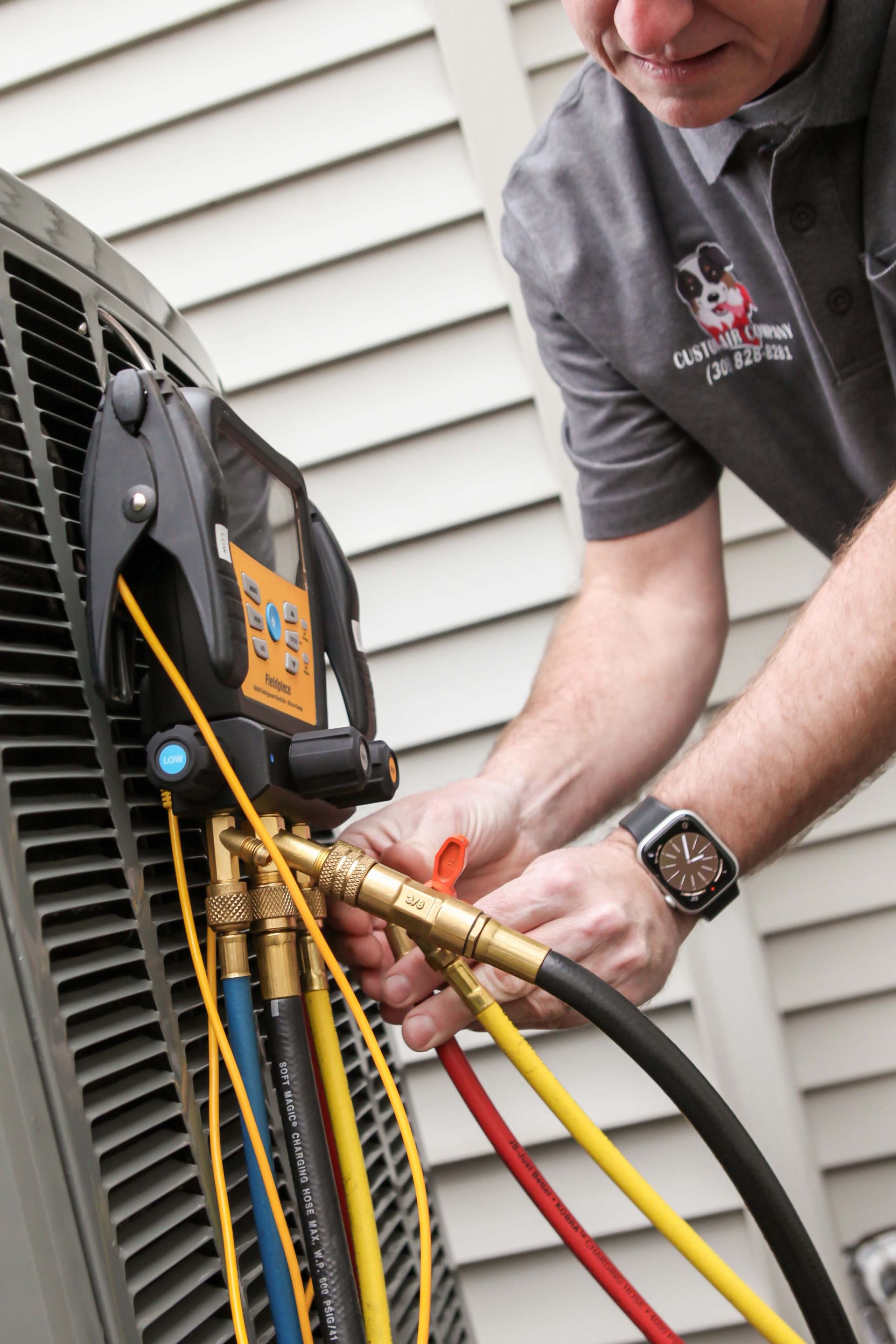 Man working on an air conditioner