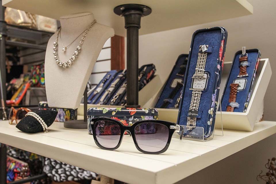 Sunglasses and jewelry at a boutique store