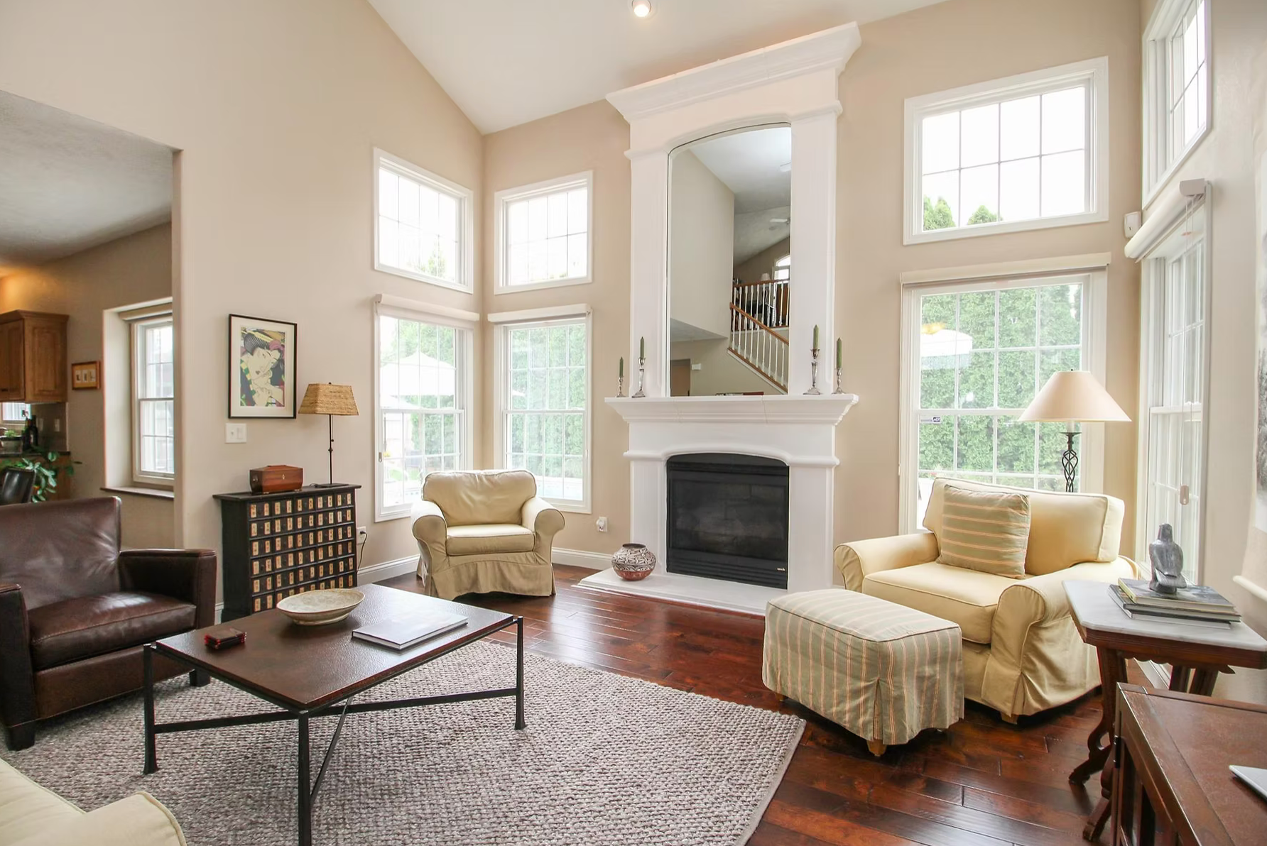 high ceiling cream colored living room