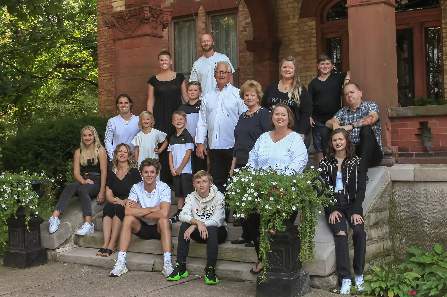 multigenerational family photo with grandparents, parents, kids