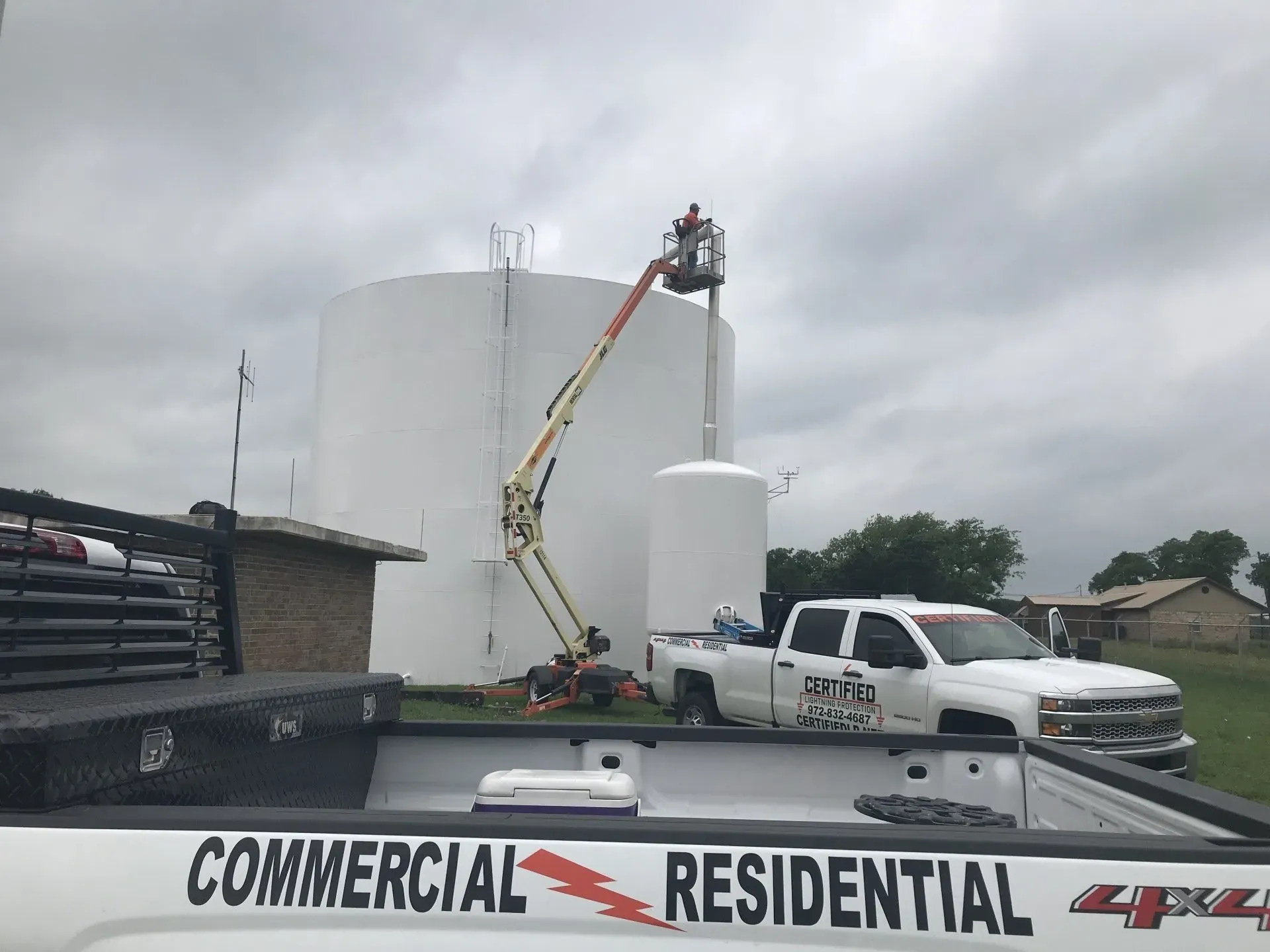 A truck that says commercial residential on the back