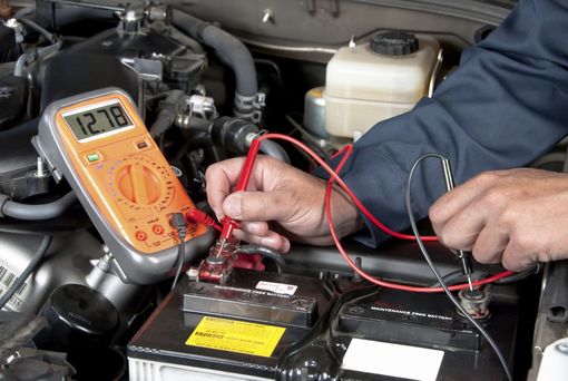 Man installing replacement battery in Cincinnati, OH