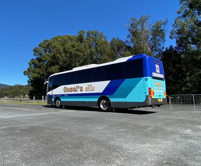 Bus with Different Shades of Blue Painted in the Exterior — Bus Service Operates in the Tweed Shire, NSW