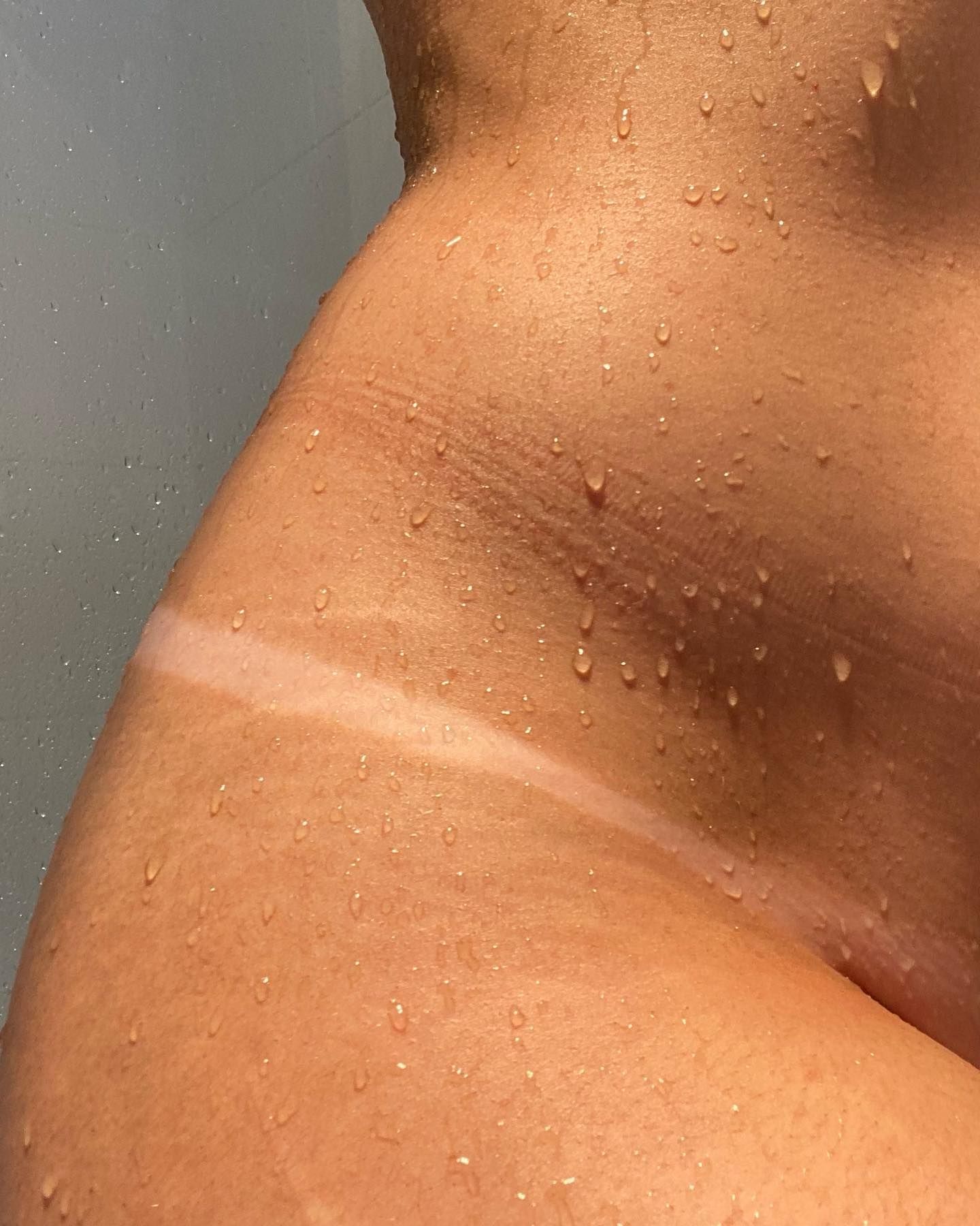 A Woman's Body With Tanned Line On Her Skin — Vanity Skin and Beauty Forster in Forster, NSW