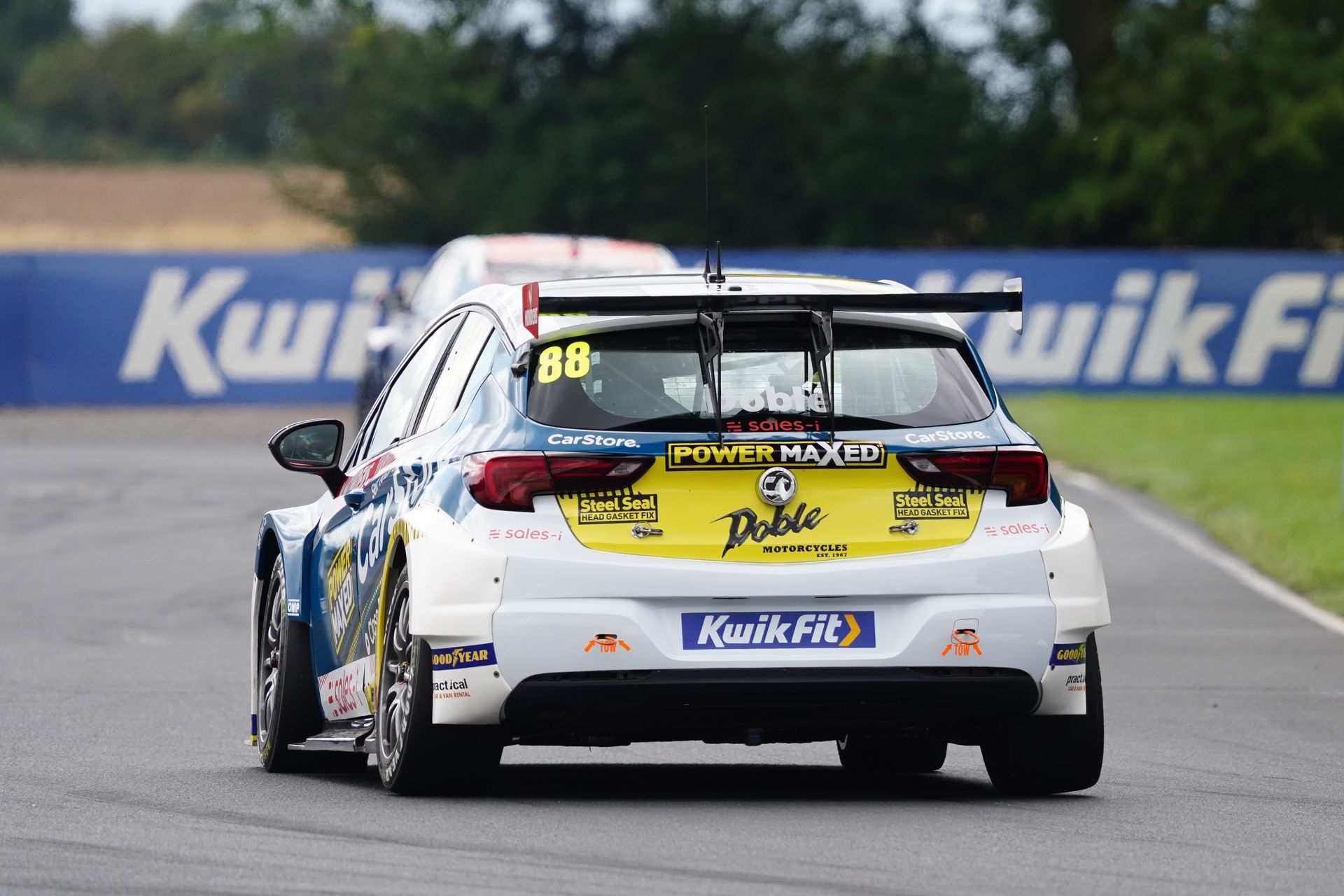 A race car with the number 59 on the back of it