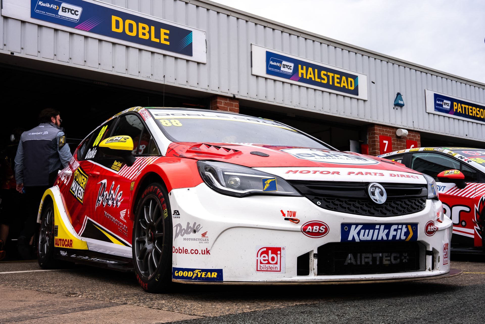 Mikey Doble outside garage at Oulton Park BTCC 2025