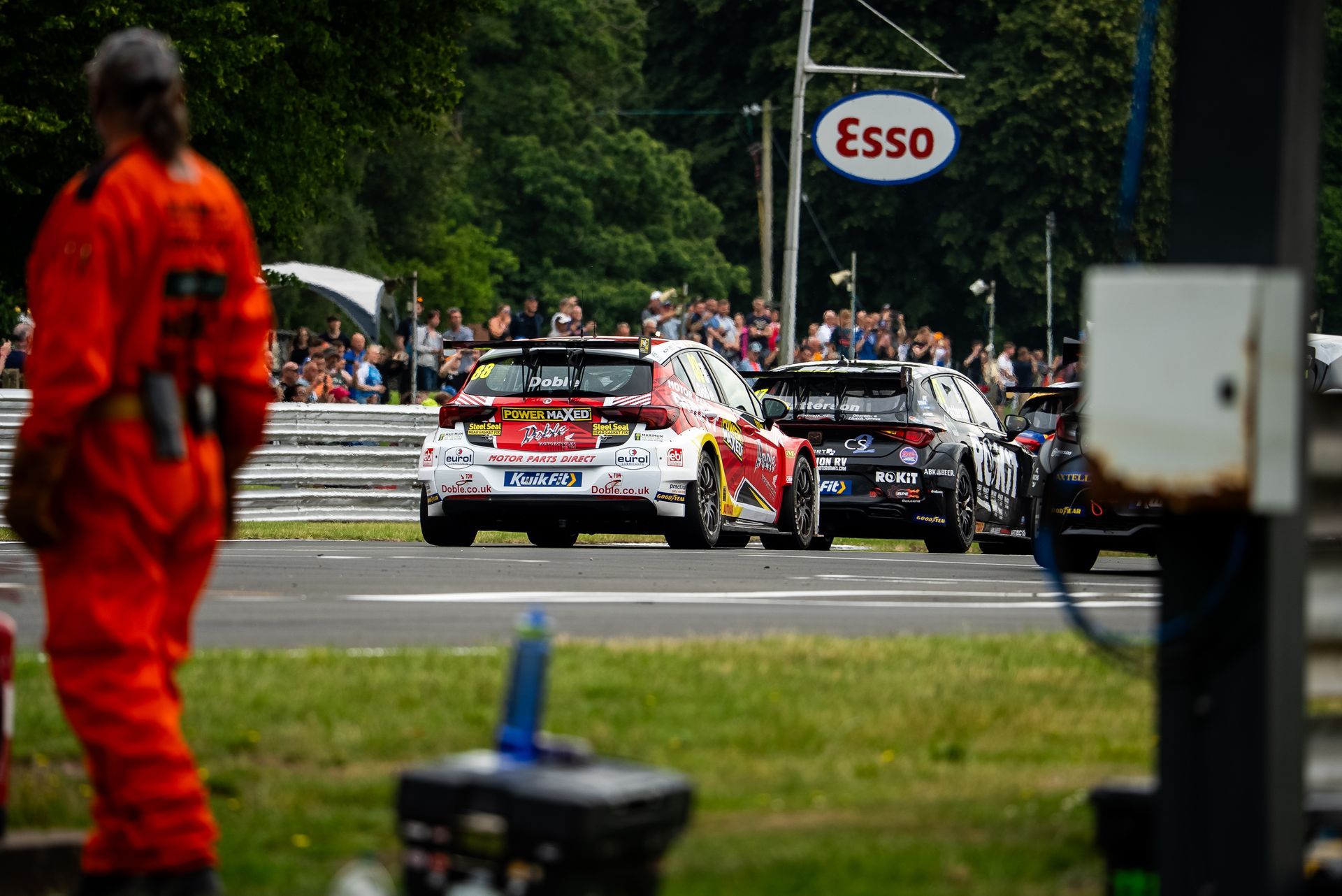 Mikey Doble passing the Esso Sign at Oulton Park 2025 BTCC