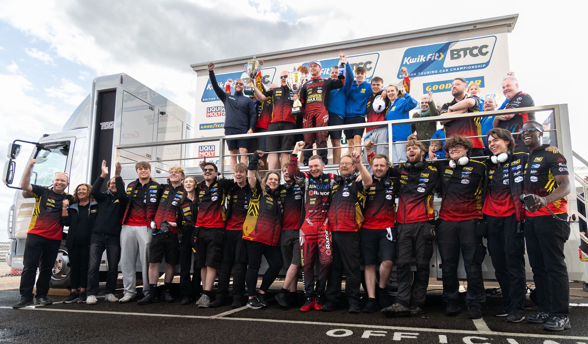 Mikey Doble's family, team and friends celebrating race win at Snetterton 2025