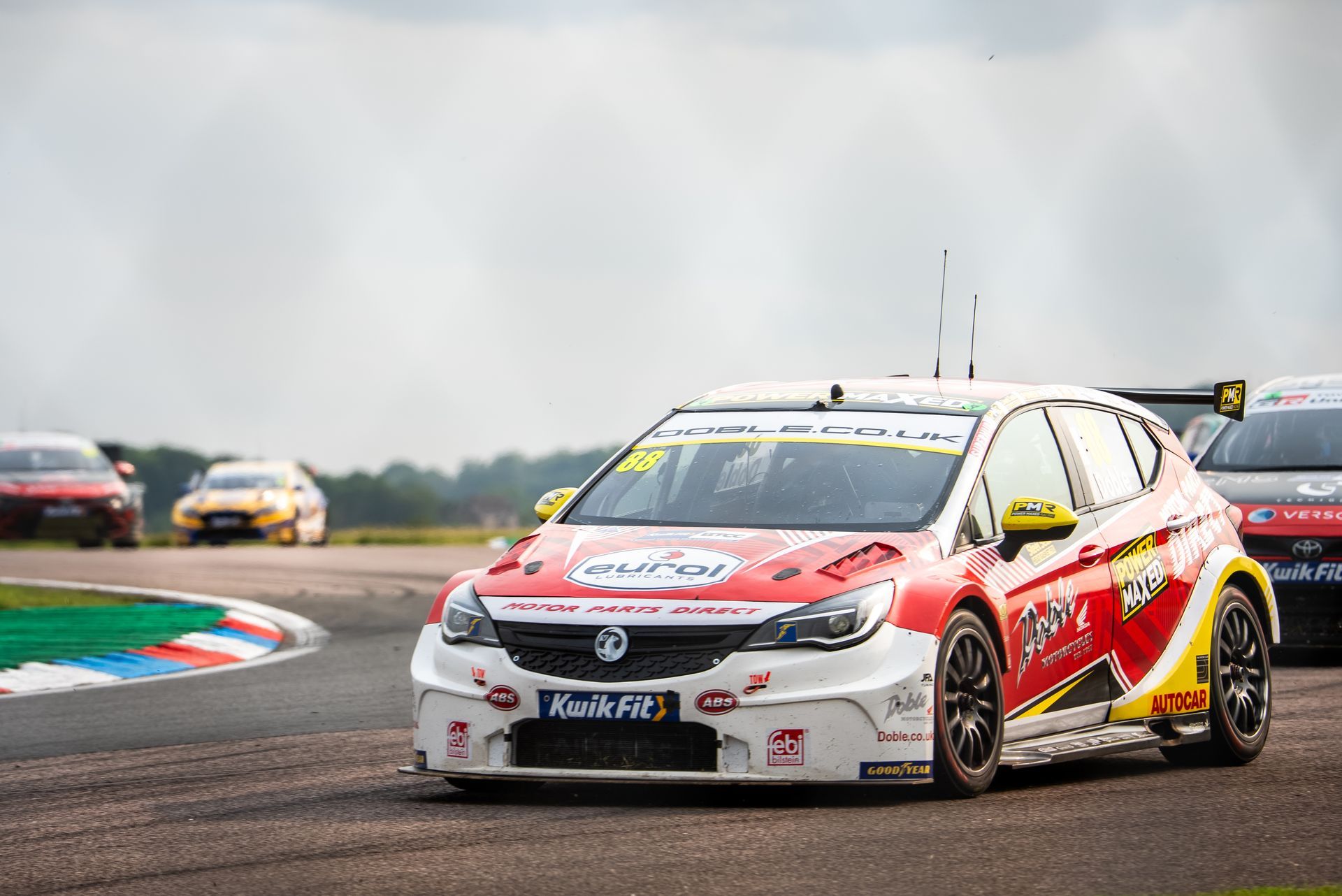 Mikey Doble leading pack at Thruxton 2025 BTCC around the Chicane