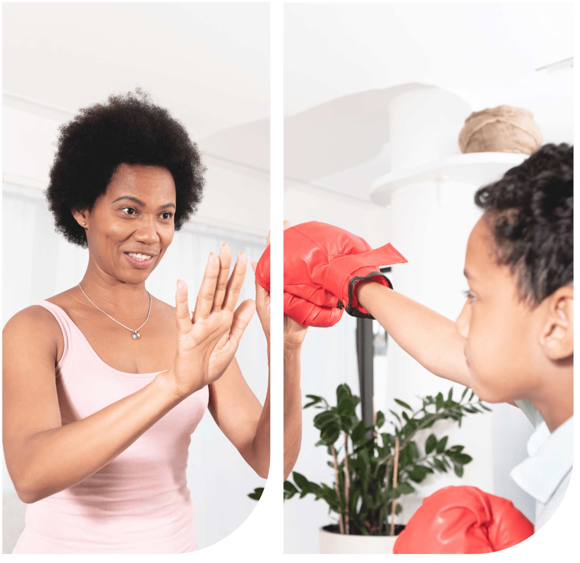 Mother practicing boxing with her child