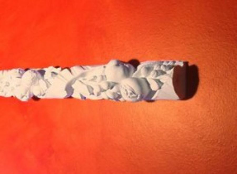 Cornice con decorazione frutta in gesso