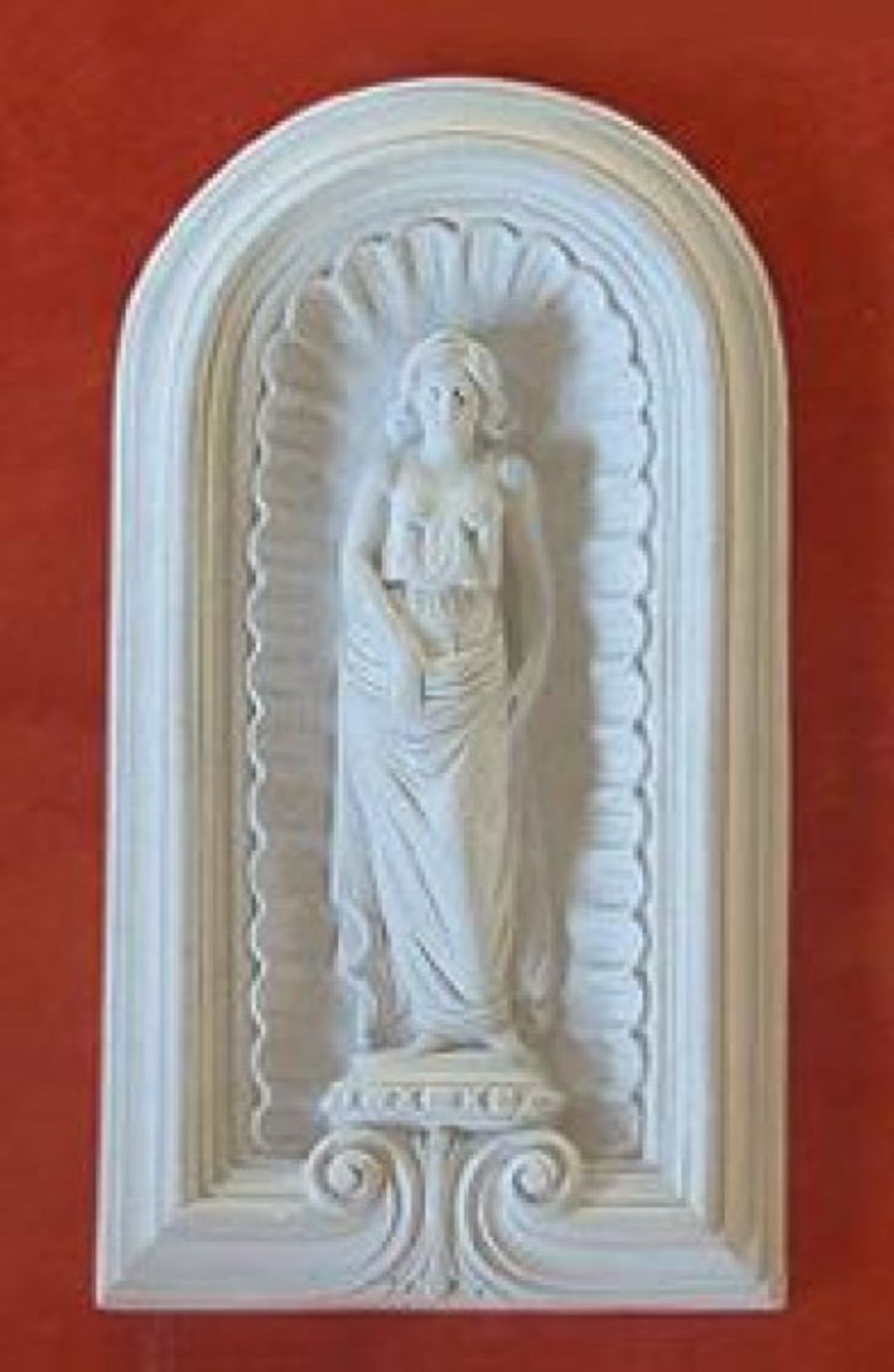 Pannello decorativo con statuetta