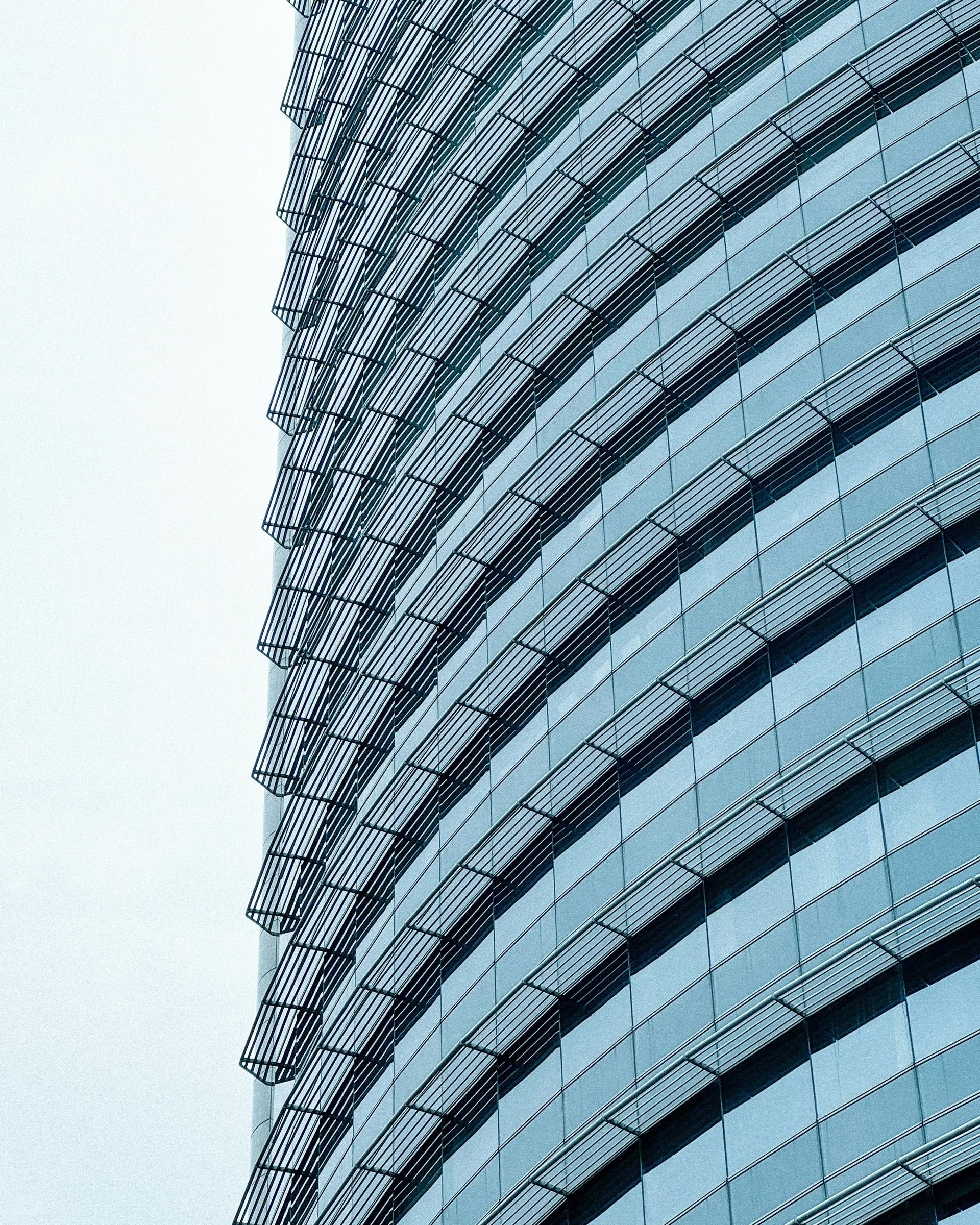 A close up of a tall building with a white background