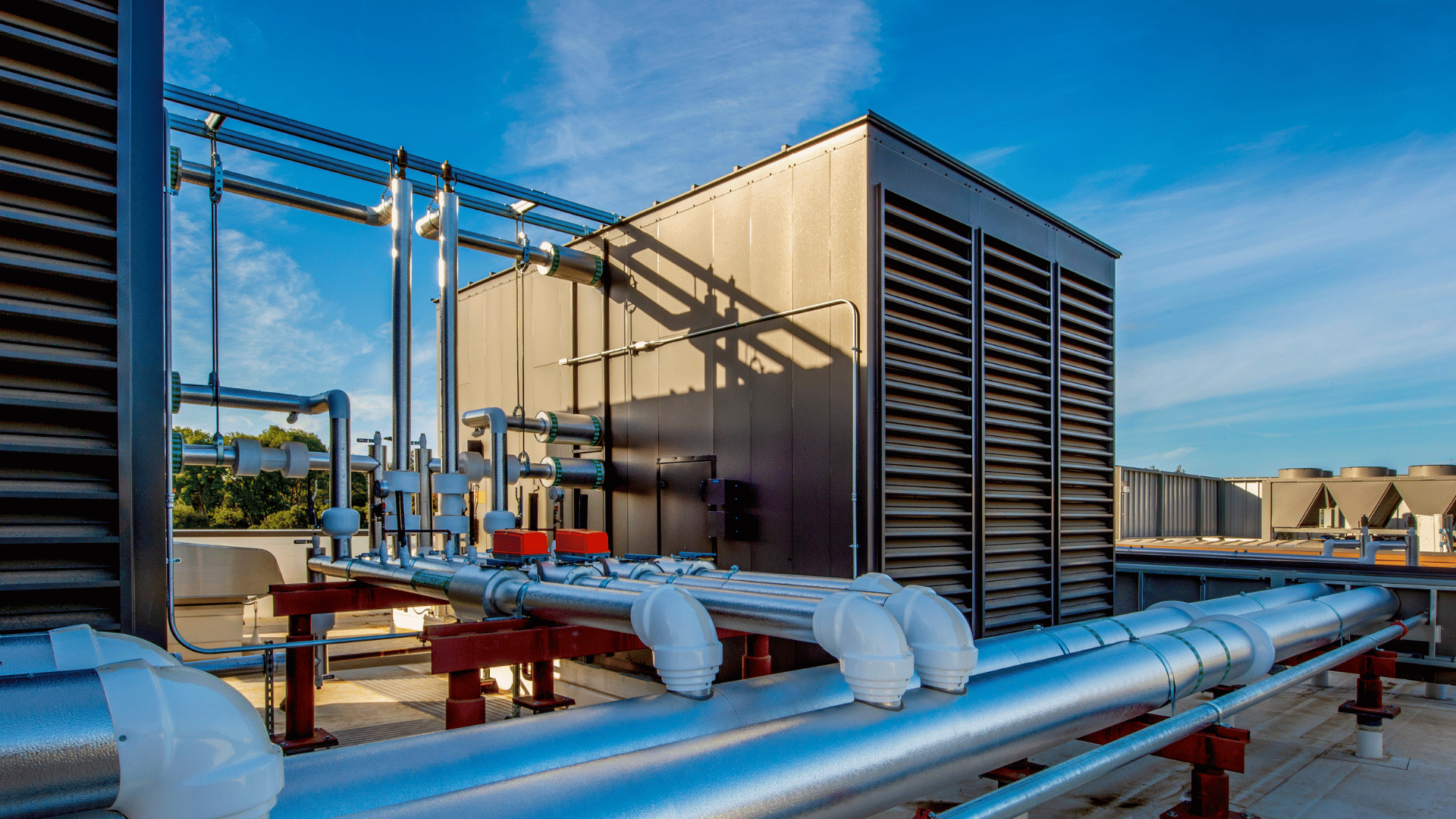American Air Services, LLC - Rooftop HVAC installation with insulated ductwork and commercial ventilation system