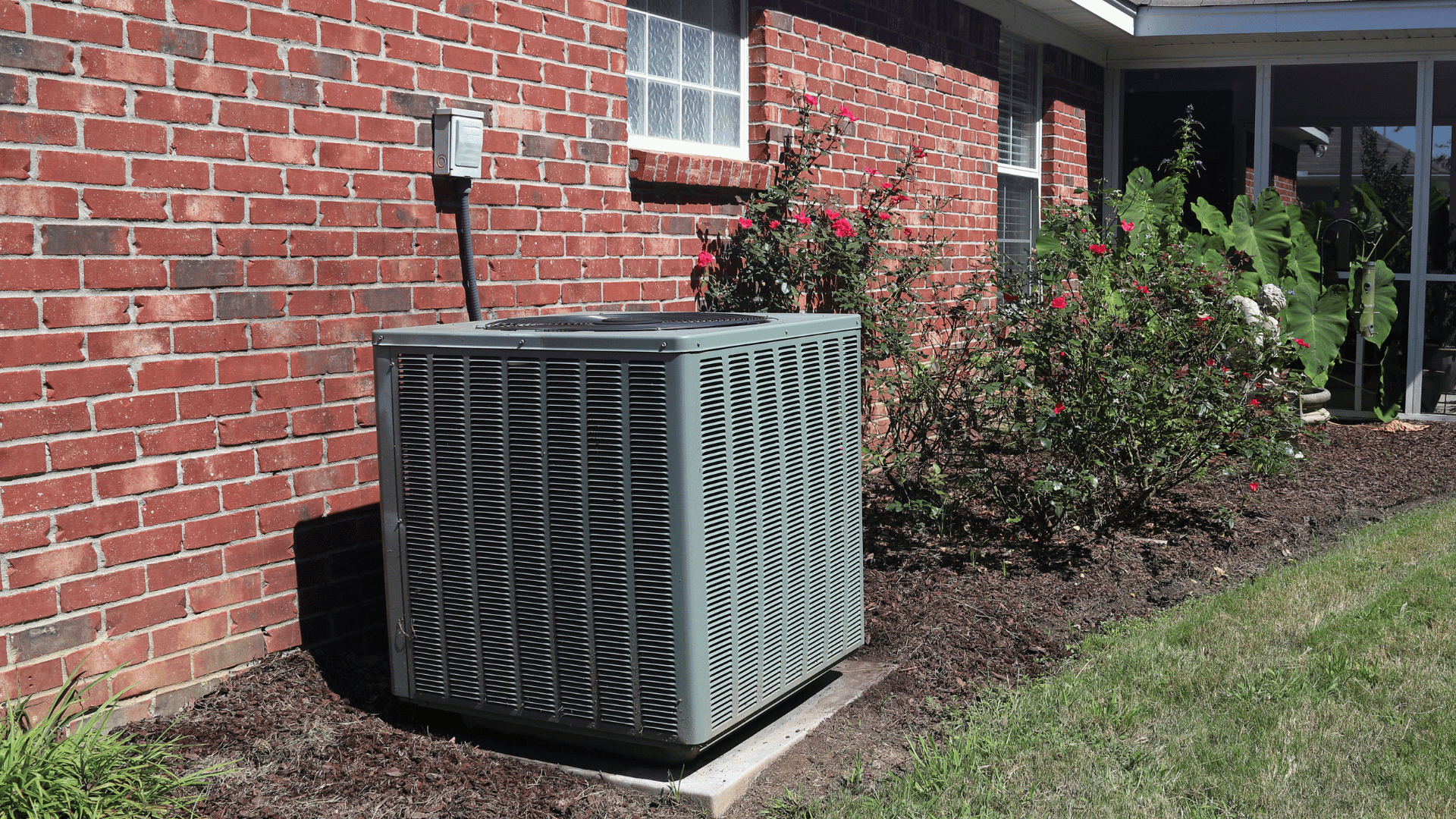 American Air Services, LLC - Installed residential HVAC unit beside brick home for air conditioning services