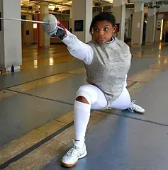 Nzingha, a Brooklyn native,  becomes one of the United States most decorated fencers