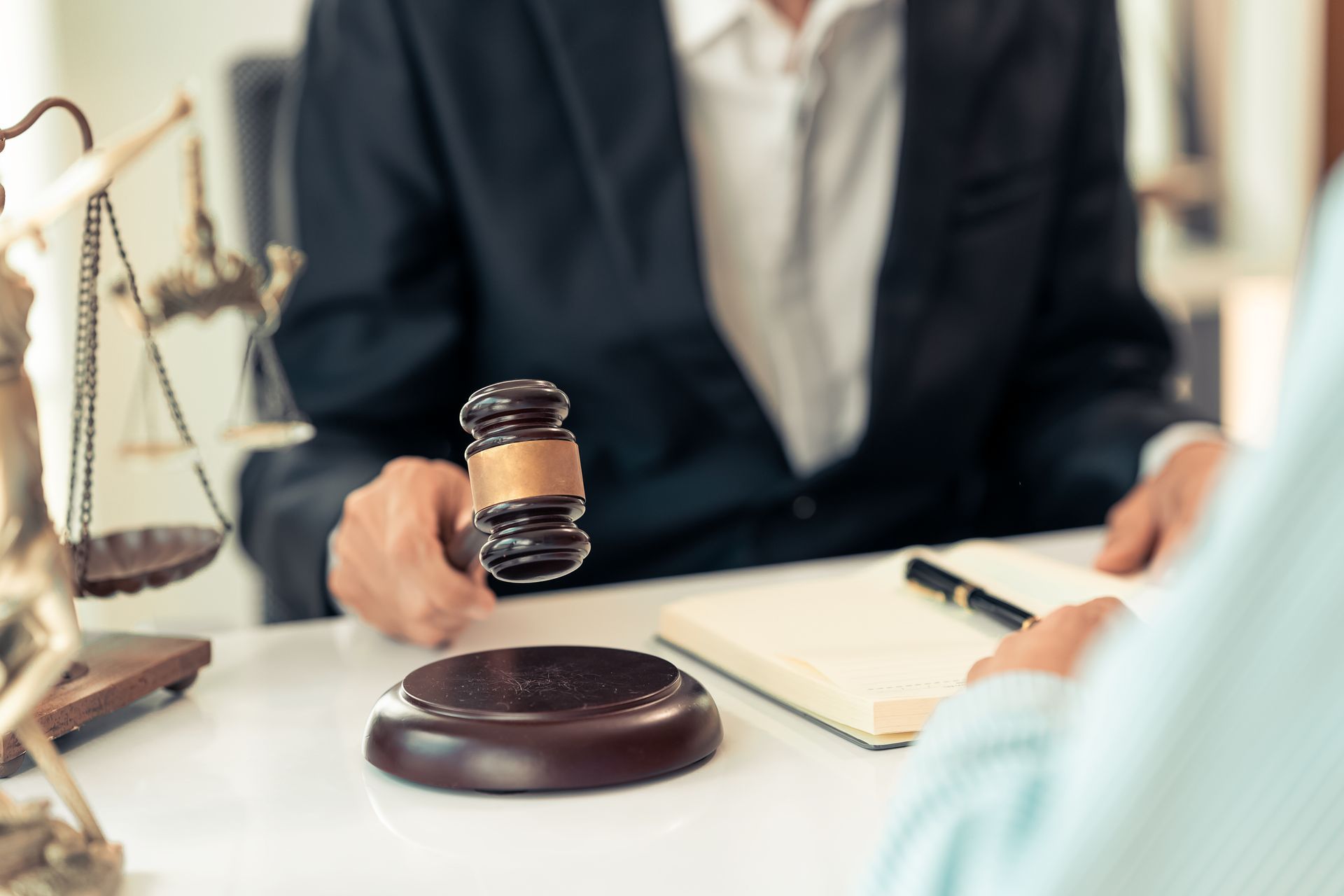 Lawyer advising clients, showcasing expertise of a trusted personal injury attorney.