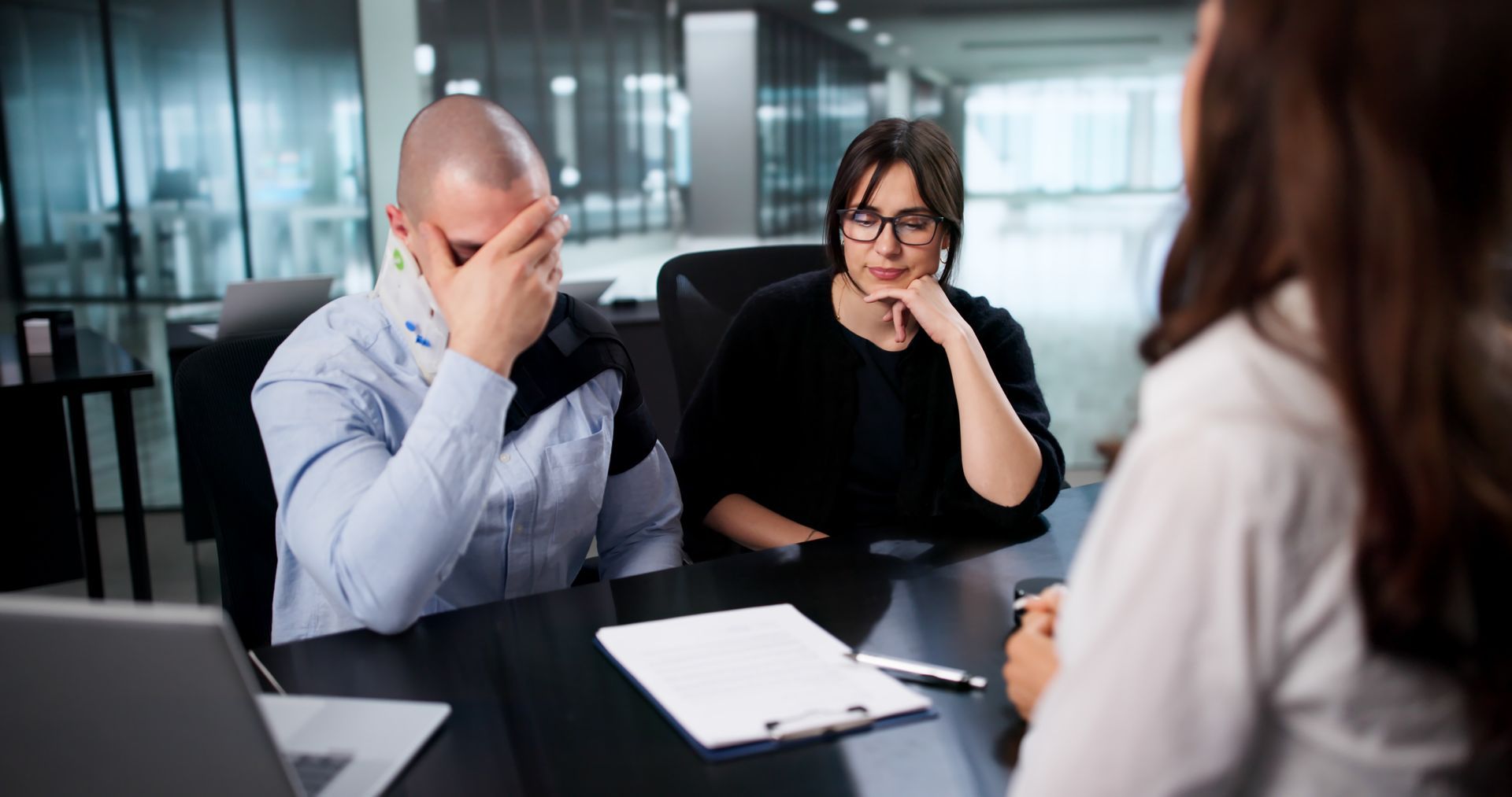 An injured man is talking to a lawyer.