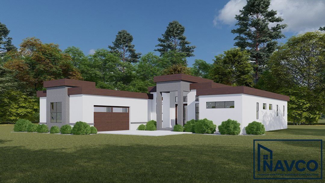 A modern, single-story white house with a dark brown flat roof, attached garage, and surrounding green landscape.