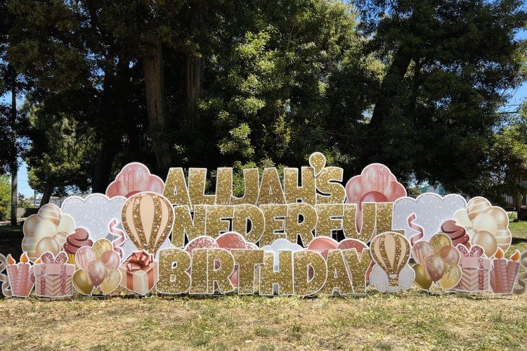 Custom birthday yard card in gold and rose gold. 