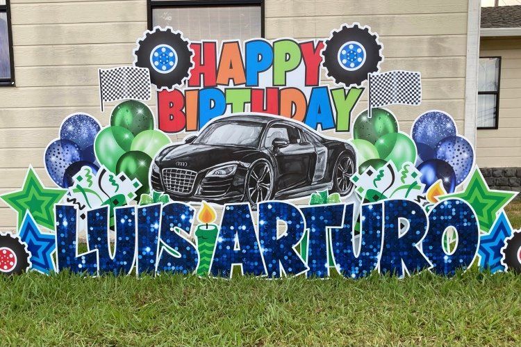 Birthday yard card in blue and green. Race car theme. 