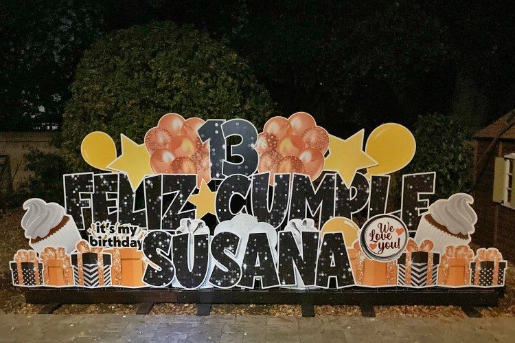 Birthday yard card in yellow and orange. 