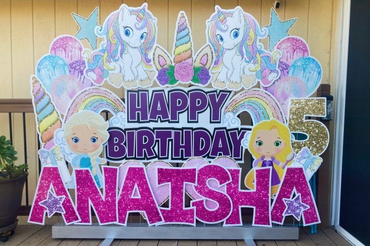 Birthday yard card in pink and purple. Unicorn theme. 